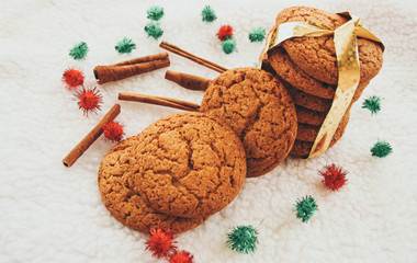 New Year and Christmas. Serpentine and garlands. Ginger and oatmeal cookies. New Year sweets. White...