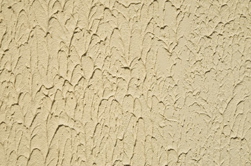 New decorative yellow plaster closeup