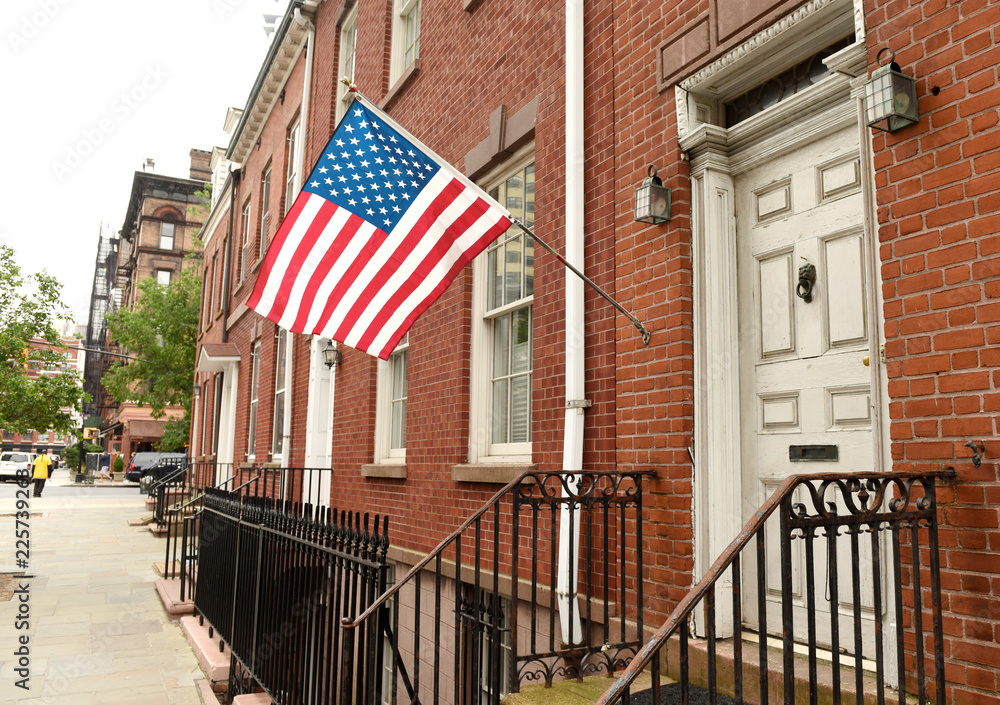 Wall mural american flag on a building in brooklyn in new york, usa