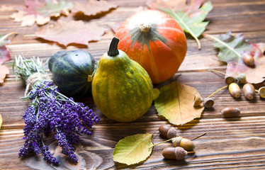 Autumn pumpkins on the wood
