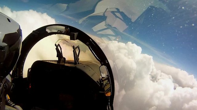 Loop of POV shots from the cockpit of a fighter plane. Loop 1 of 2.