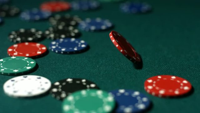 Loop of Poker chip spinning in slow motion