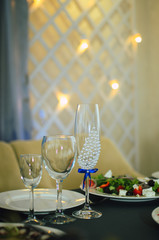 The restaurant is decorated with wedding decor, Banquet hall . The table of the bride and groom