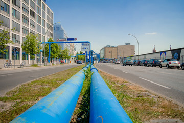 Blue pipes at the street of Berlin city