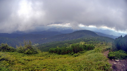 Clouds and fog over mountains