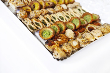 Tray of appetizers and small tarts for a cocktail
