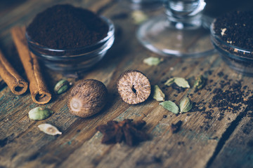 Spices for masala chai or chai latte. Nutmeg, cardamom, cinnamon and anis