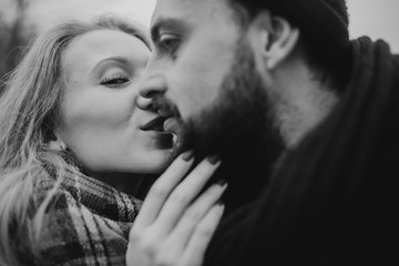Portrait of couple. Young couple in love and fun, hug and travel in the nature. The concept of tenderness and affection. Romantic black and white photo