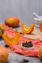 Pumpkins on grey background.