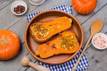 Baked pumpkin in a clay dish.
