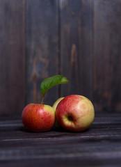 Juicy apples on a wooden table