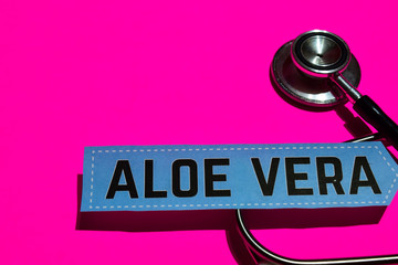 Aloe Vera on the print paper with medicare Concept Inspiration. Stethoscope on pink bakcground  - Powered by Adobe