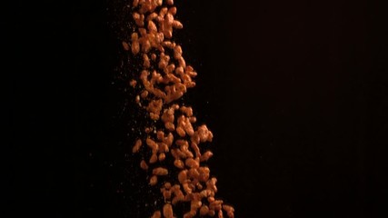 Loop of Chocolate rice cereal falling - Powered by Adobe