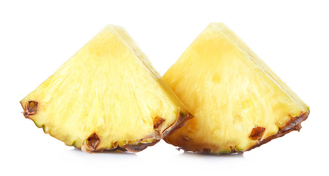Two pineapple slices isolated on white background