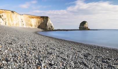 Long exposure photograph of Freshwater Bay beach. Isle of White, UK.