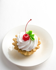 Traditional Russian cake with cherries on top.