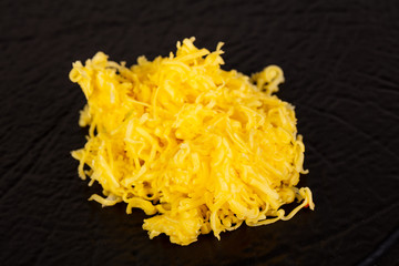 Shredded cheese topping