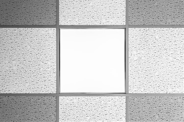ceiling lamp type LED panel is integrated into the suspended ceiling with soundproof panels, type...
