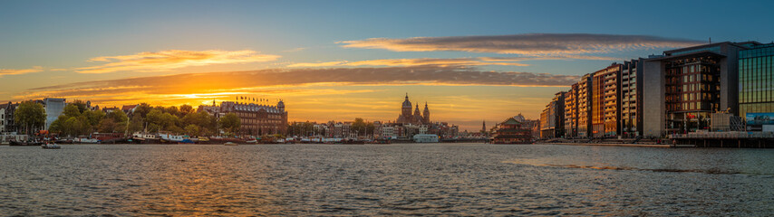 Amsterdam skyline at sunset © Mikael