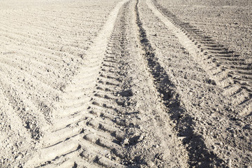 Wheel tracks on the ploughed field