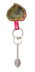 big door key on green heart shaped key fob