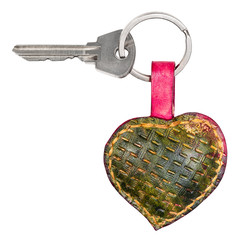 door key on green heart shaped key fob cutout