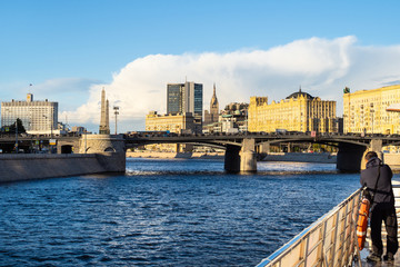 oscow city and Borodinsky Bridge from on Moskva river