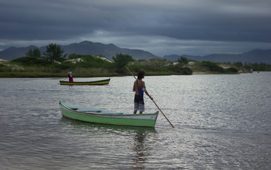a boy taking his boat