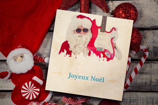 Composite image of  black wooden frame and christmas ornament