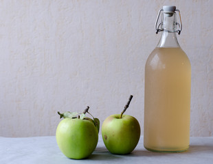 Apple juice on light background
