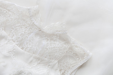 Fototapeta na wymiar White wedding dress with accessories
