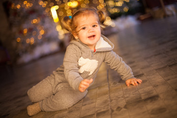 beautiful baby on christmas decorated room