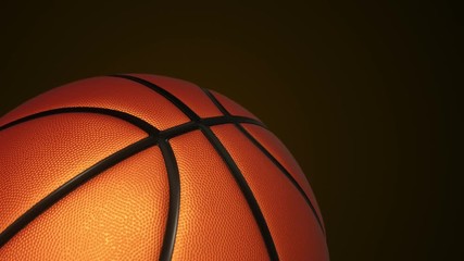 Animation of slow rotation ball for basketball game. View of close-up with realistic texture and light. Animation of seamless loop.