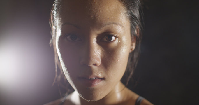 Portrait Of Athletic Woman Sweating Taking A Break From Workout