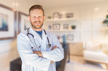 Handsome Young Adult Male Doctor With Beard Inside Office