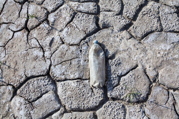 Old plastic bottle on the ground