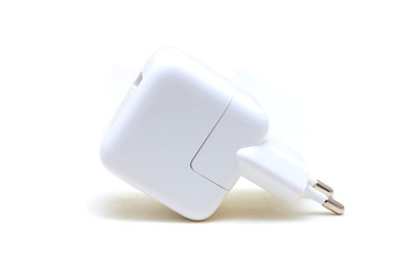 Power adapter with plug on white isolated background