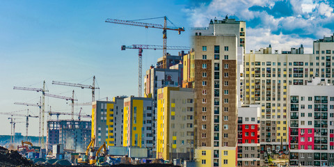Construction of new residential buildings against the sky . The concept of the construction...