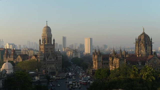 Time lapse footage of Municipal headquarter BMC and Chhatrapati Shivaji Terminus (CSMT) formerly Victoria Terminus in Mumbai, India is a UNESCO World Heritage Site and historic railway station.	
