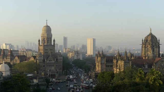 Time lapse footage of Municipal headquarter BMC and Chhatrapati Shivaji Terminus (CSMT) formerly Victoria Terminus in Mumbai, India is a UNESCO World Heritage Site and historic railway station.	
