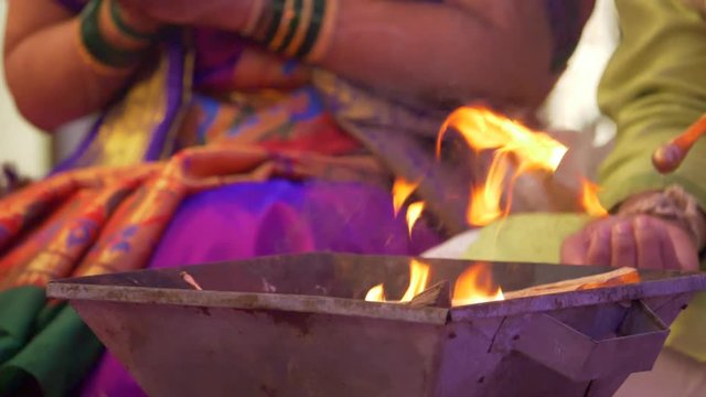 Indian Hindu wedding rituals in slow motion shot in Mumbai, India.	
