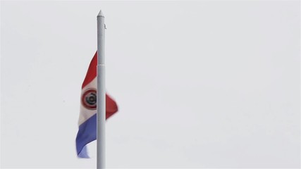 Paraguay Flag on Cloudy Sky. 