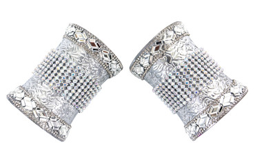It is two silver armband decoration with glass gems and diamonds isolated on white background