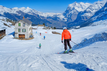 Skiers skiing at Kleine Scheidegg, Switzerland