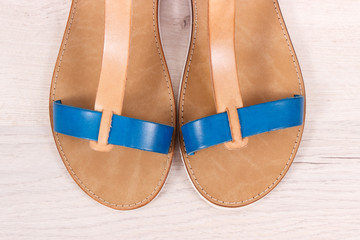 Comfortable leather sandals for woman on white board