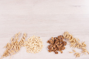 Granola and oat flakes as source iron and fiber, healthy snack concept, place for text