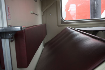 View of the empty seats in the lower second-class compartment wagon train