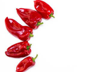 Red pepper on white background. Natural farm product. Image for cafe advertising, food.