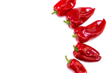 Red pepper on white background. Natural farm product. Image for cafe advertising, food.