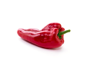 Red pepper on white background. Natural farm product. Image for cafe advertising, food.